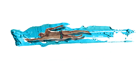 Image showing Professional caucasian swimmer moving in paint brushstroke, watercolor. Grace of motion and action. Artwork.