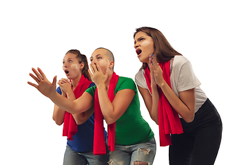 Image showing Female soccer fans cheering for favourite sport team with bright emotions isolated on white studio background