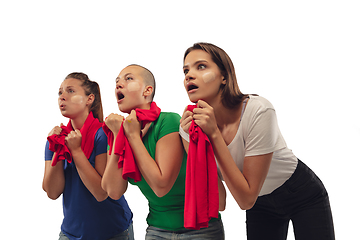 Image showing Female soccer fans cheering for favourite sport team with bright emotions isolated on white studio background