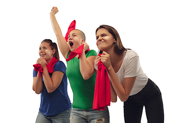 Image showing Female soccer fans cheering for favourite sport team with bright emotions isolated on white studio background