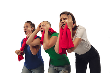 Image showing Female soccer fans cheering for favourite sport team with bright emotions isolated on white studio background