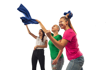 Image showing Female soccer fans cheering for favourite sport team with bright emotions isolated on white studio background