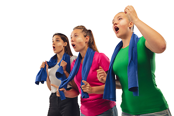 Image showing Female soccer fans cheering for favourite sport team with bright emotions isolated on white studio background