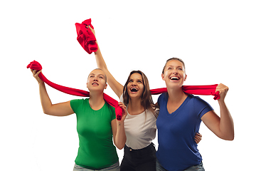 Image showing Female soccer fans cheering for favourite sport team with bright emotions isolated on white studio background