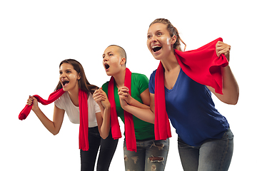 Image showing Female soccer fans cheering for favourite sport team with bright emotions isolated on white studio background