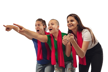 Image showing Female soccer fans cheering for favourite sport team with bright emotions isolated on white studio background