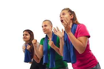 Image showing Female soccer fans cheering for favourite sport team with bright emotions isolated on white studio background