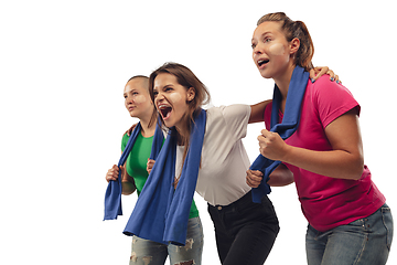 Image showing Female soccer fans cheering for favourite sport team with bright emotions isolated on white studio background