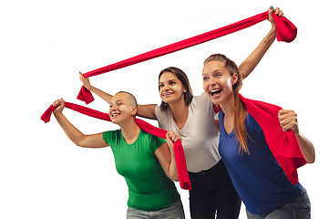 Image showing Female soccer fans cheering for favourite sport team with bright emotions isolated on white studio background