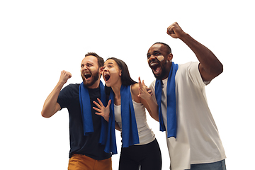 Image showing Multiethnic soccer fans cheering for favourite sport team with bright emotions isolated on white studio background