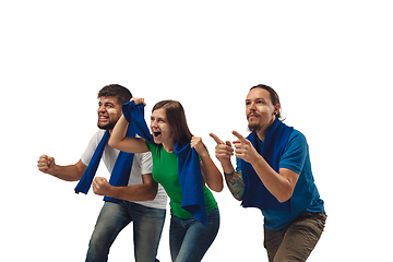 Image showing Two men and woman as soccer fans cheering for favourite sport team with bright emotions isolated on white studio background