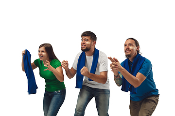 Image showing Two men and woman as soccer fans cheering for favourite sport team with bright emotions isolated on white studio background