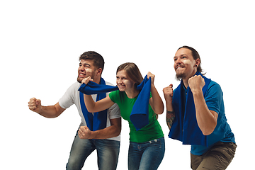 Image showing Two men and woman as soccer fans cheering for favourite sport team with bright emotions isolated on white studio background