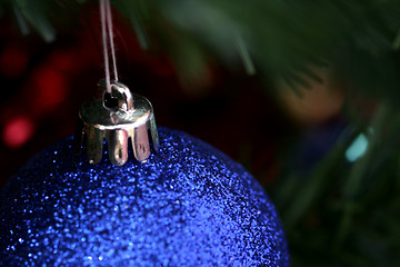 Image showing Christmas ornaments on tree.