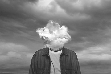 Image showing Contemporary art collage. Black and white, Male body of model with head full of smoke about sky and clouds.