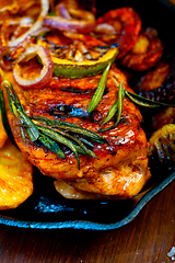 Image showing roasted grilled BBQ chicken breast with herbs and spices