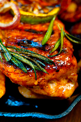 Image showing roasted grilled BBQ chicken breast with herbs and spices