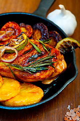 Image showing roasted grilled BBQ chicken breast with herbs and spices