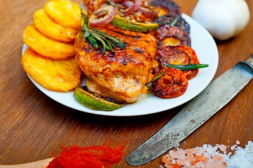 Image showing roasted grilled BBQ chicken breast with herbs and spices