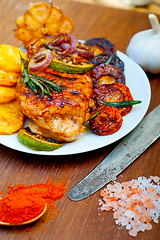 Image showing roasted grilled BBQ chicken breast with herbs and spices