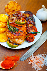 Image showing roasted grilled BBQ chicken breast with herbs and spices