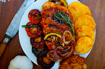 Image showing roasted grilled BBQ chicken breast with herbs and spices