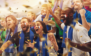 Image showing Group of happy fans are cheering for their team victory. Collage made of 9 models.