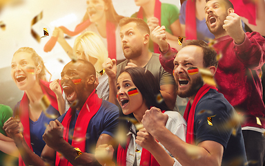 Image showing Group of happy fans are cheering for their team victory. Collage made of 9 models.