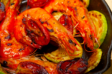 Image showing roasted shrimps with zucchini and tomatoes