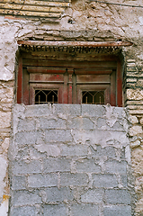 Image showing bricked up vintage door and grungy wall