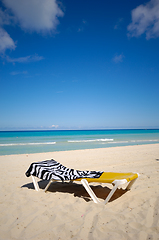 Image showing Sunlounger at exotic beach