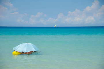 Image showing Parasol at exotic beach