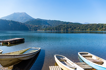 Image showing Mount Kirishima and lake with boat