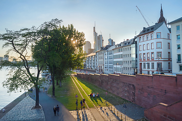 Image showing People relaxing city embankment Frankfurt