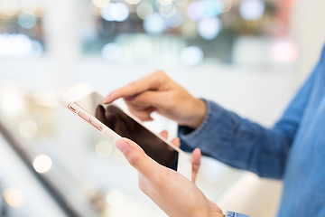 Image showing Woman working on cellphone