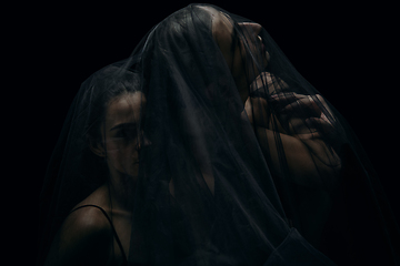 Image showing Graceful classic ballet dancers isolated on black studio background. The grace, artist, movement, action and motion concept.