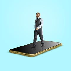 Image showing Office worker, businessman going on the surface of smartphone\'s screen isolated on background