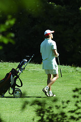 Image showing Golfer walking