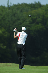 Image showing man golfer doing a swing