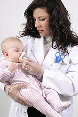 Image showing Medicating Baby