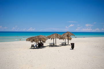 Image showing Tropical beach with parasols