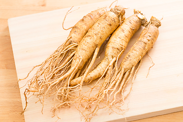 Image showing Ginseng over wood background