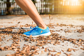 Image showing Woman jogging in a city