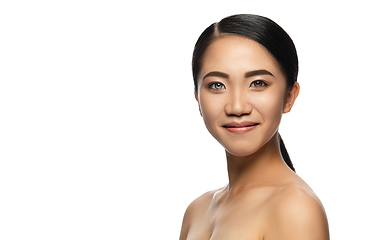 Image showing Beautiful asian woman with heterochromia isolated on white studio background