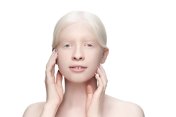 Image showing Beautiful albino woman with heterochromia isolated on white studio background