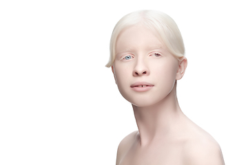 Image showing Beautiful albino woman with heterochromia isolated on white studio background