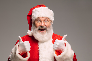 Image showing Senior man like Santa Claus isolated on grey studio background