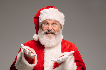 Image showing Senior man like Santa Claus isolated on grey studio background