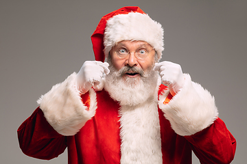 Image showing Senior man like Santa Claus isolated on grey studio background