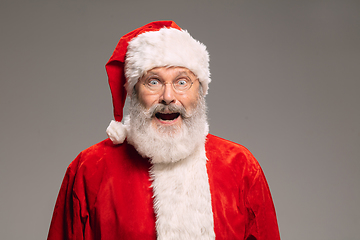 Image showing Senior man like Santa Claus isolated on grey studio background